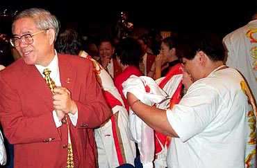 Celebrations inside the IOC meeting site in Moscow. July 2001.