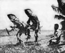Navajos dance on a beach in the Solomons. Photo U.S. Army Signal Corps