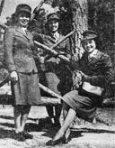 Three Indian girls in the Women's Reserve of the U.S. Marine Corps:
Left to right, Minnie Spotted Wolf,, Montana; Celia Mix,
Potawatomi, Michigan; and Viola Eastman, Chippewa-Sioux, Minnesota.
