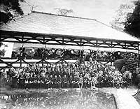 Photo # NH 1562:  Great White Fleet officers pose with Japanese officers and those of other nations, during an entertainment hosted by the Japanese Minister of War at Tokyo, October 1908