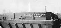 Photo # NH 99345:  U.S. Navy Concrete Barge # 442 in port, 1918