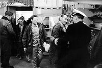 Photo # K-64711: USS Pueblo crewmen arrive at U.N. Advance Camp just after their release, 23 Dec. 1968