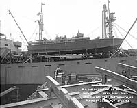 Photo # 19-N-33165:  USS PT-109 stowed on board SS Joseph Stanton for transportation to the Pacific, 20 August 1942