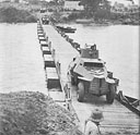 South African armoured cars cross the Juba River over 'Union Bridge' at Yonte.