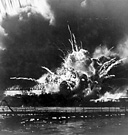 THE DESTROYER USS SHAW EXPLODING during the attack on Pearl Harbor,
7 December. The first attack on the U.S. warships anchored in the harbor was
delivered at 0758. By 0945 all the Japanese aircraft had left Oahu and returned
to their carriers. The U.S. Pacific Fleet suffered a major disaster during the
attack which lasted one hour and fifty minutes. Sunk or damaged during the
attack were the destroyers Shaw, Cassin, and Dowries;
the mine layer Oglala;
the target ship Utah; and a large floating drydock. Also hit were the light cruisers 
Helena, Honolulu, and Raleigh; the seaplane tender Curtis;
and the repair ship Vestal.