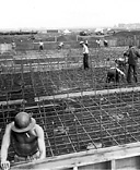 CONSTRUCTION WORK AT WHEELER FIELD, 11 December 1941. After the
Japanese raid many destroyed or damaged buildings were rebuilt.