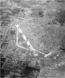 BOMB CRATERS ON THE RUNWAY AT LIPA AIRFIELD in Batangas Province