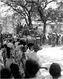 FILIPINO RESIDENTS OF CEBU CITY welcome infantry and armored troops