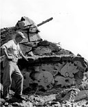 A DUMMY JAPANESE TANK carved in the soft volcanic ash