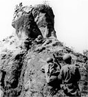 MARINES FIRING ON ENEMY SOLDIERS hidden in a cave