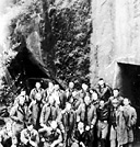 CREW IN CHINA after raiding Tokyo. About noon on 18 April the medium
bombers from the Hornet reached Tokyo and near-by cities. After dropping their
bombs they flew on to China where they ran out of fuel before reaching their
designated landing fields. The crews of only two of the planes fell into Japanese
hands. The others lived in the mountains for about ten days after assembling and
were later returned to the United States. The news of the raid raised morale in
the United States and while the damage inflicted was not great, it proved to the
Japanese that they needed additional bases to the east to protect the home
islands of Japan.