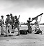 BROWNING ANTIAIRCRAFT MACHINE GUN on a runway at Wheeler Field,
Oahu, in the Hawaiian Islands. Early in December 1941 all the U.S. troops,
including antiaircraft batteries, were returned to their stations from field maneuvers
to await the signal for riot duty. Trouble was expected, and while Japanese
diplomats in Washington talked peace, their Pearl Harbor Striking Force was
moving eastward toward Hawaii. During this movement the fleet maintained
radio silence and was not detected as it approached the islands. (.50-caliber
anti-aircraft machine gun, water-cooled, flexible.)