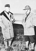 BRIG. GEN. C. L. STURDEVANT (left) and Col. James A. O'Connor ready to board a plane for an inspection flight over the southern section of the Alaska Highway, 1942