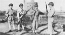 Chinese Nationalist sentries relive Marine bridge guards at Chinwangtao in October 1946