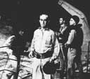 Oil painting of Adm. Turner, with Capt. Doyle, Col. Harris and Cmdr Lewis, by Albert K. Murray