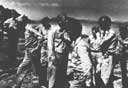 Rear Admiral Turner with Seabee officers after witnessing training operations