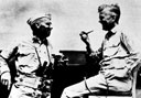 Rear Admiral Harry W. Hill and Brigadier General Thomas E. Watson on board USS Cambria, February 1944