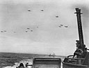PT's cross English Channel on D-day as Army bombers pass overhead