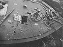 Forward deck of PT 152, showing effect of enemy 4.7-inch shell in the Battle of Surigao Strait