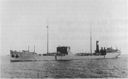 Cuyama, after commissioning. Note the bridge house and the absence of two of the four centerline masts installed on Kanawha. (Naval Historical Center)