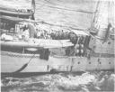 A pair of 4-inch fuel hoses are being hauled aboard an unidentified destroyer during fueling-at-sea exercises circa 1932. (Author's collection)