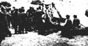 Figure 138.--Rendering first aid on the invasion beach.