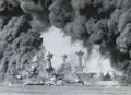 Image: 80-G-32414 ;Dense smoke frames USS West Virginia and USS Tennessee.