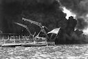 Image: 80-G-32422 "National ensign flying from stern of USS West Virginia"