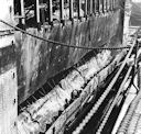 Image: USN NR&L (MOD) 39753 tUSS West Virginia, showing distortion in armor belt and damage above and below on port side looking aft.t