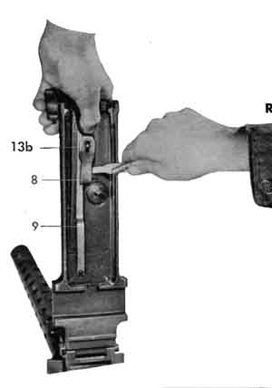 Removing the cover latch spring.