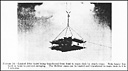Figure 14.--Loaded litter hoist being transferred from boat to main deck by ship's crane.
Note heavy line bent on hoist to prevent swinging. The 10-litter cases can be loaded and
transferred to main deck in 6 to 7 minutes.