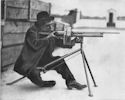 McClean Machine Gun, Cal. .30, Being Fired by the Inventor