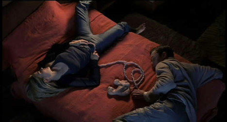 Allegra and Pikul moving in and out of gamerspace in eXistenZ