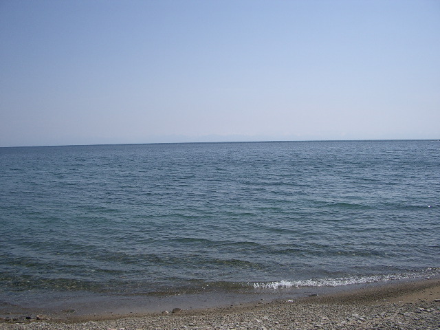 Unseeable snowcapped mountains thru the mists across Baikal