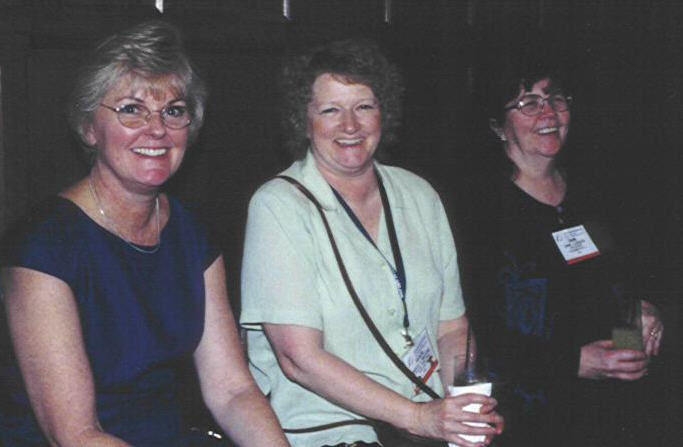 Ginny 



        Hauswald, Marcia MacVane and Diane Logsdon enjoy the reception before the awards banquet.