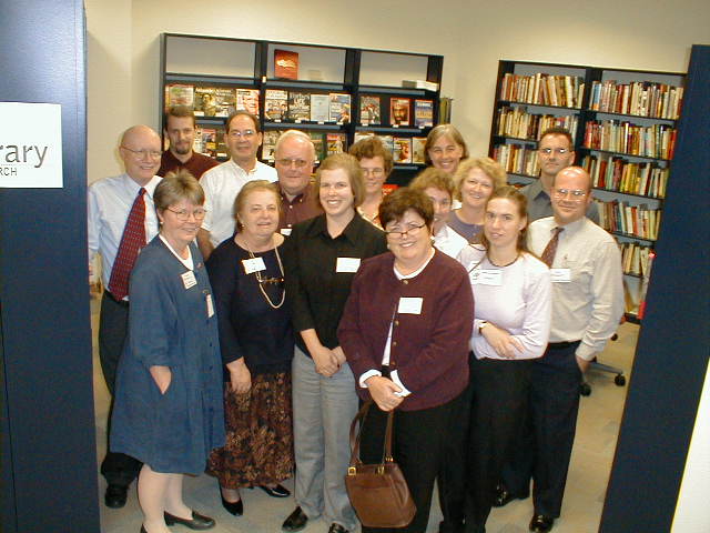 The group of NENLA attendees gather in the Christian Science Monitory's library
