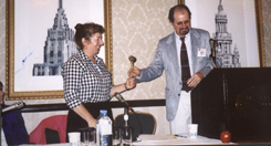 Michael Jesse hands the gavel to Linda Henderson