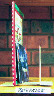 A single reference book sits on a shelf at Siayne School in the Kwazulu-Natal Province