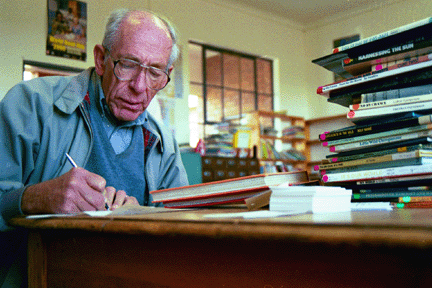 WLP volunteer Art Freed processes donated books from the Untied Kingdom.