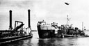 LST Moves in to Secure to a Leibnitz Pier, OMAHA Beach