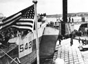 Unloading activities at OMAHA Beach MULBERRY