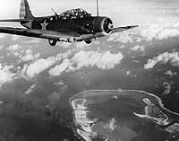 Photo # 80-CF-1071-1:  Douglas TBD-1 flies over Wake Island, February 1942