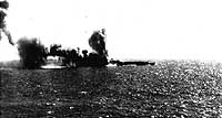 Photo # 80-G-17025:  Japanese aircraft carrier Shoho is hit by U.S. air attacks, 7 May 1942
