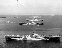 Photo #  80-G-294131:  Third Fleet aircraft carriers in Ulithi Atoll, 8 December 1944.  USS Wasp is in the foreground.