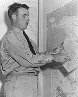 Photo # 80-G-35733:  LCdr. Dudley W. Morton at a press conference, circa February 1943
