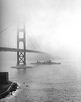 Photo # 80-G-40093:  USS San Francisco passes under the Golden Gate Bridge, Dec. 1942