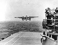 Photo # 80-G-41196: Army B-25 bomber takes off from USS Hornet at the start of the Doolittle Raid on Japan, 18 April 1942