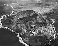 Photo # 80-G-412503: View looking northward over Mount Suribachi on Iwo Jima, circa late February 1945.