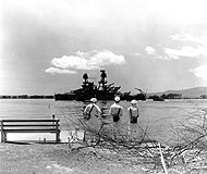 Photo # 80-G-64768: USS Nevada departing Pearl Harbor after temporary repair of bomb and torpedo damage received during the 7 December 1941 Japanese air raid.