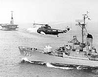 Photo # USN 710896:  HSS-2 helicopter hovers near USS Decatur (DD-936), circa May 1961